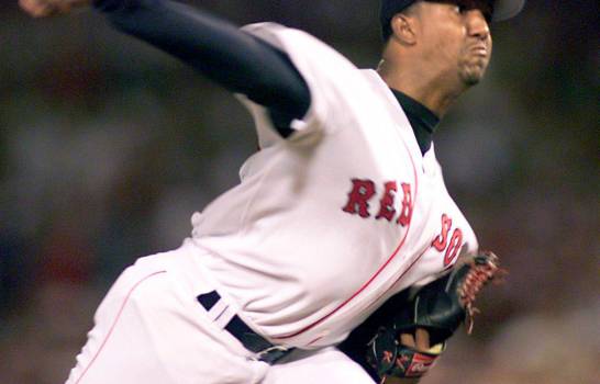 Pedro Martinez and Juan Marichal holding the Dominican flag at the