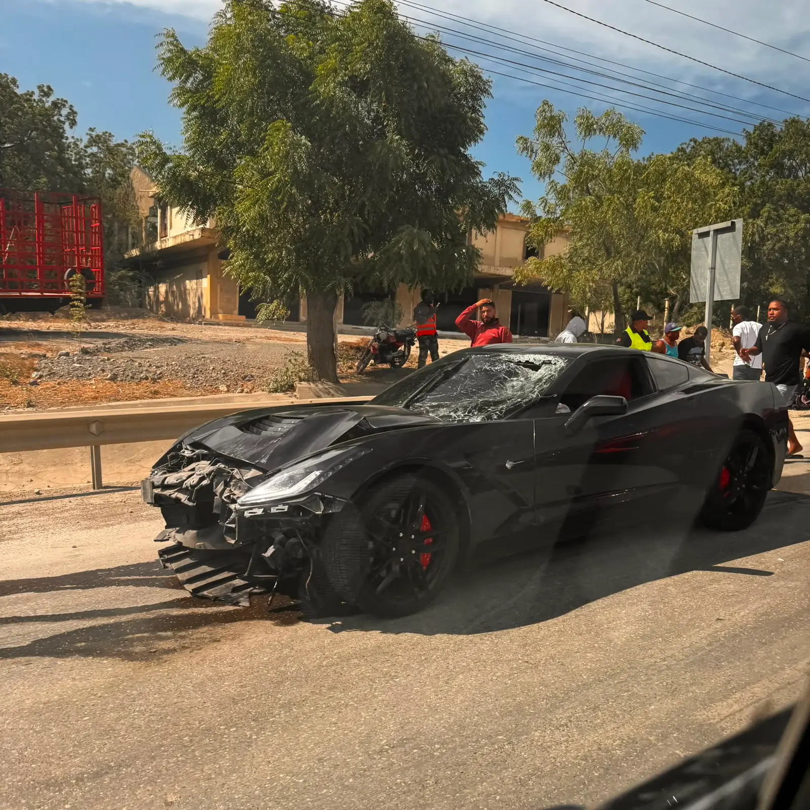 Sports car crashes into motorcycle in Santiago; collision leaves two dead, including a one-year-old girl